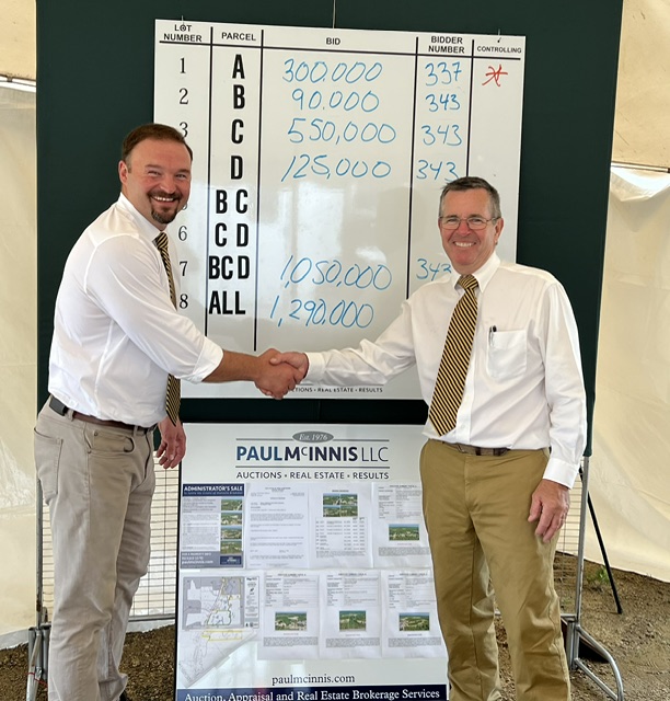 Paul Mcinnis LLC Auctioneers Shaking Hands After Successful Real Estate Auction